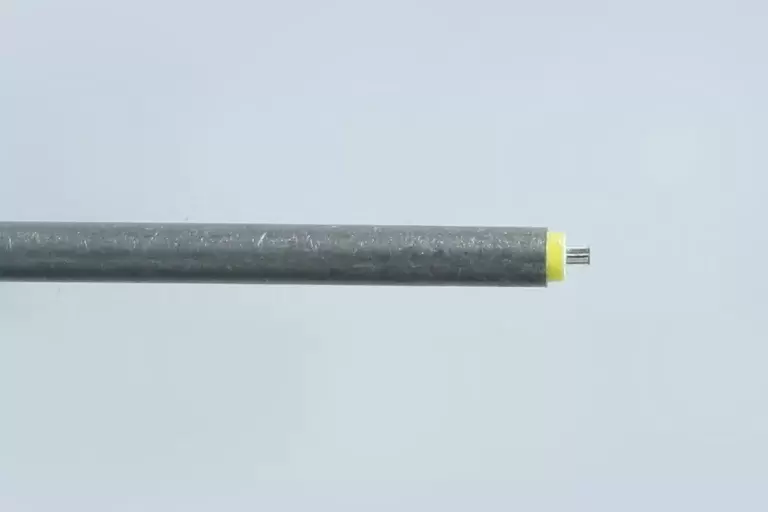 Silver wire with two wrapper of color black and yellow.